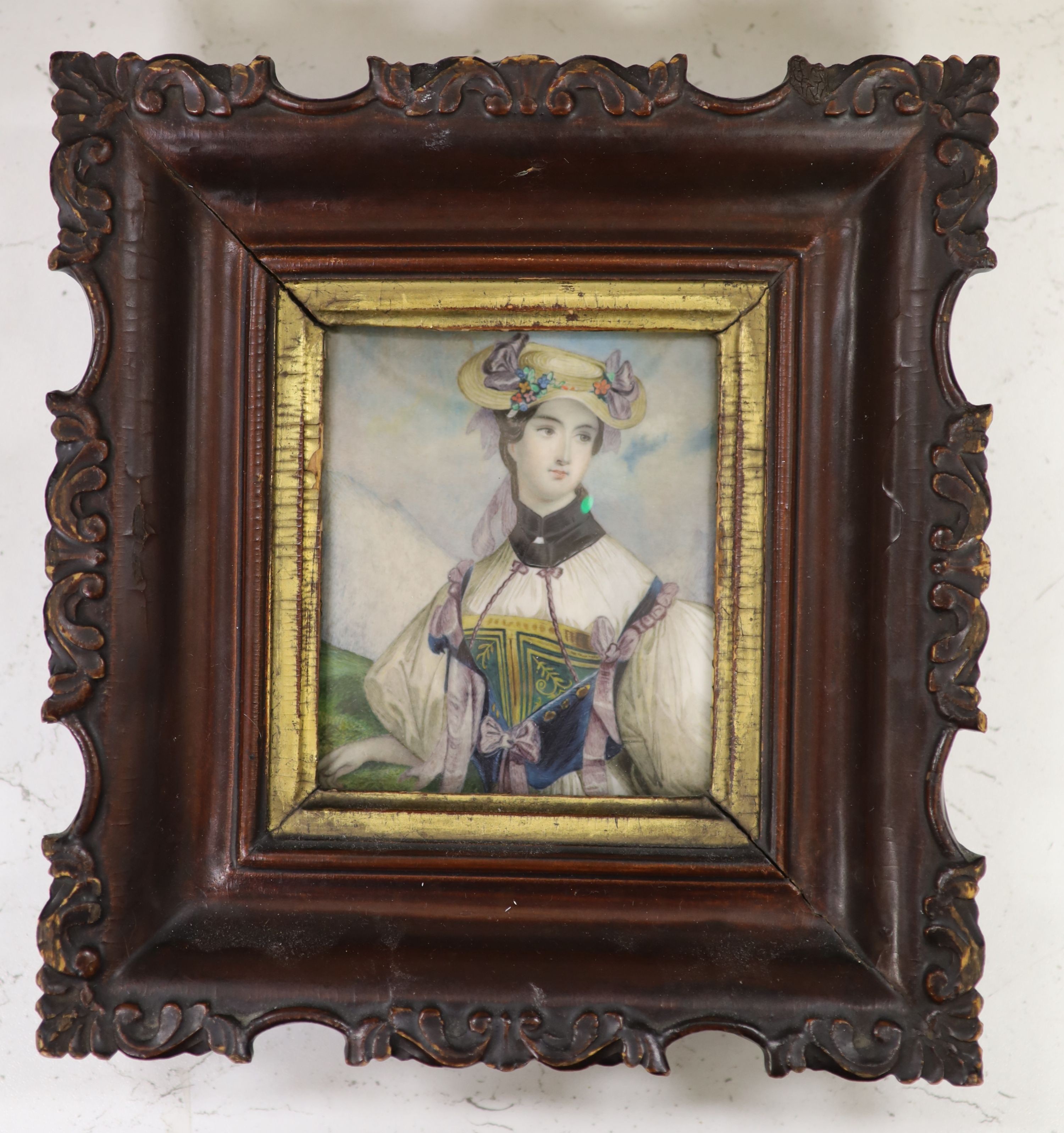 A large 19th century portrait miniature of a lady, the figure in elaborate dress, her hat adorned with bows and flowers, indistinctly inscribed verso, 10 x 8.5cm.